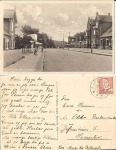 Postkort sendt først i 1950erne. Udsyn ned gennem bredgade mod stationen.